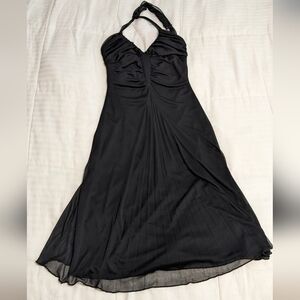 Cute v-neck little black dress with a tie around the neck and flowy skirt Sm